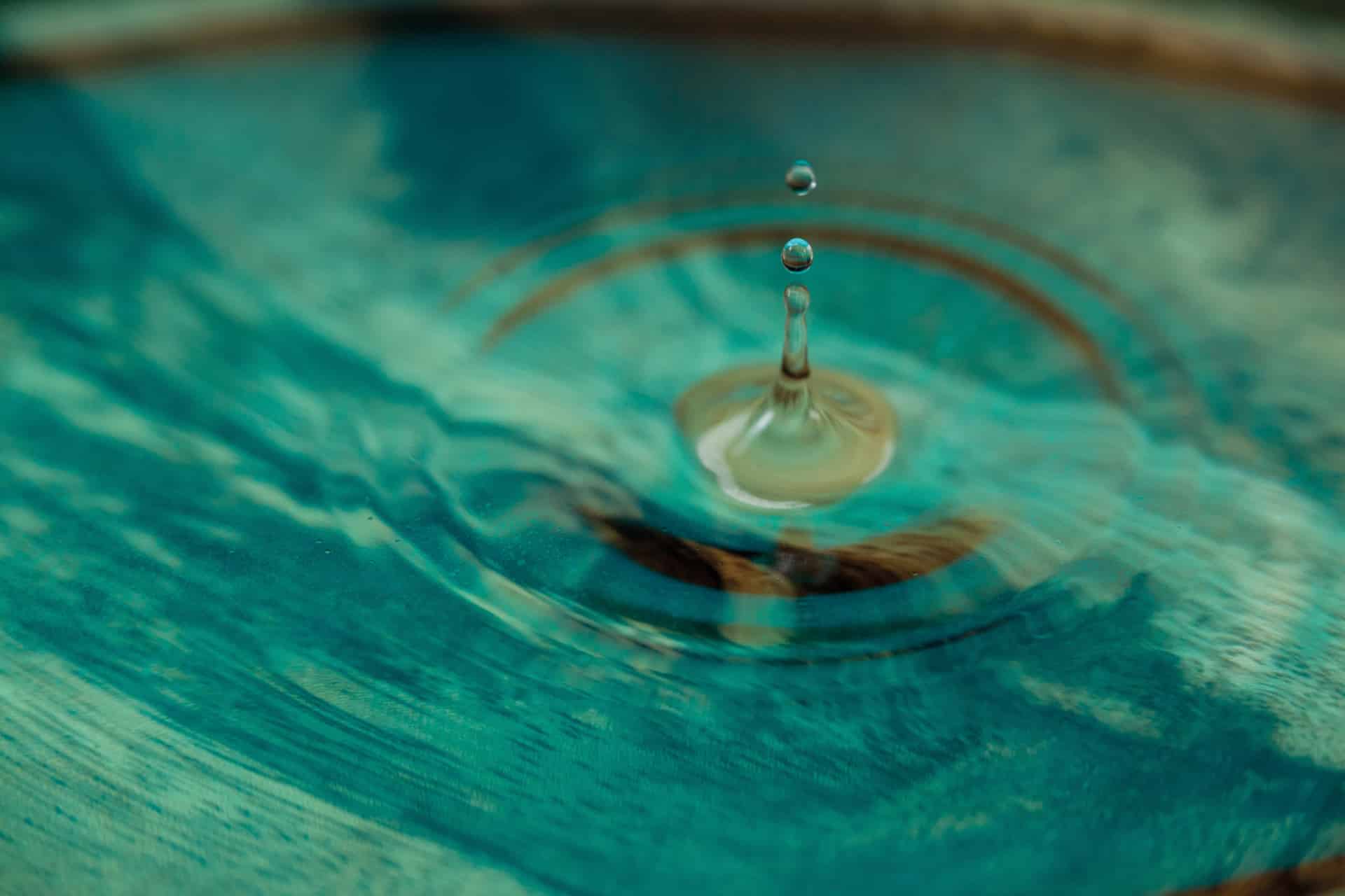 Close-up of drops falling in water